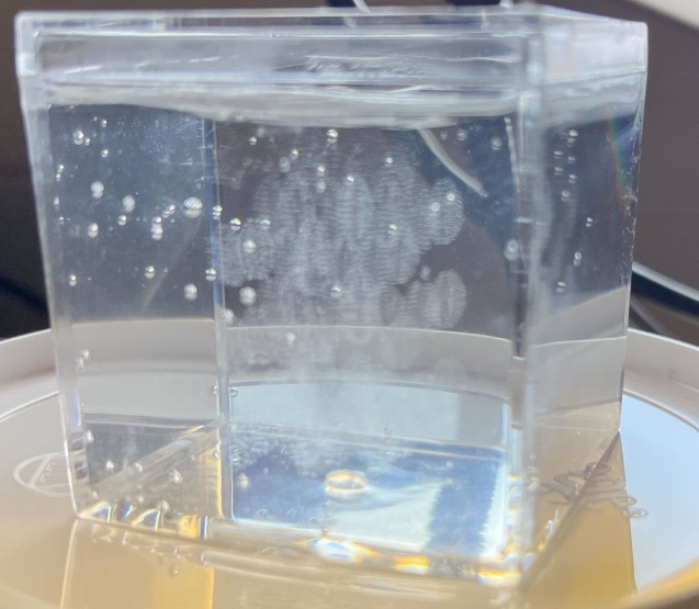 Gel container with interwoven skeins visible inside